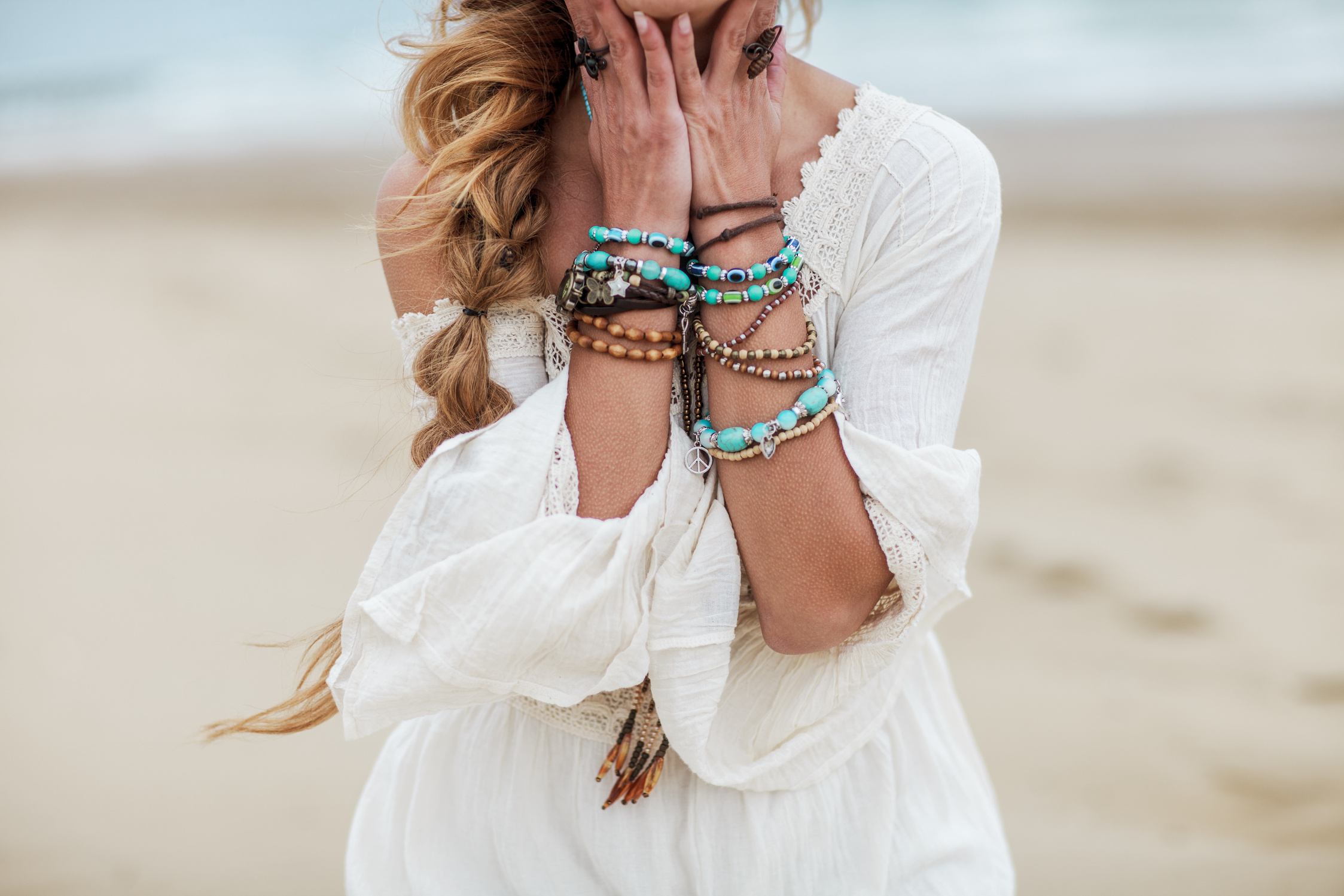 Boho woman with multicolored jewelry